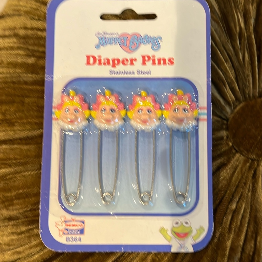Vintage set of Miss Piggy diaper pins, set of four.